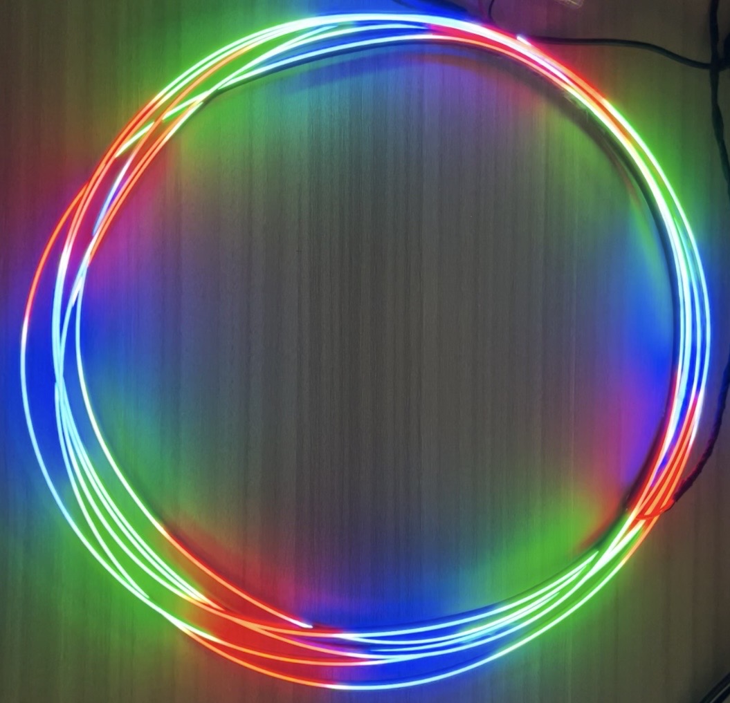 RGB light-guide ring lit in red, green and blue — GoldenCZ automotive lighting